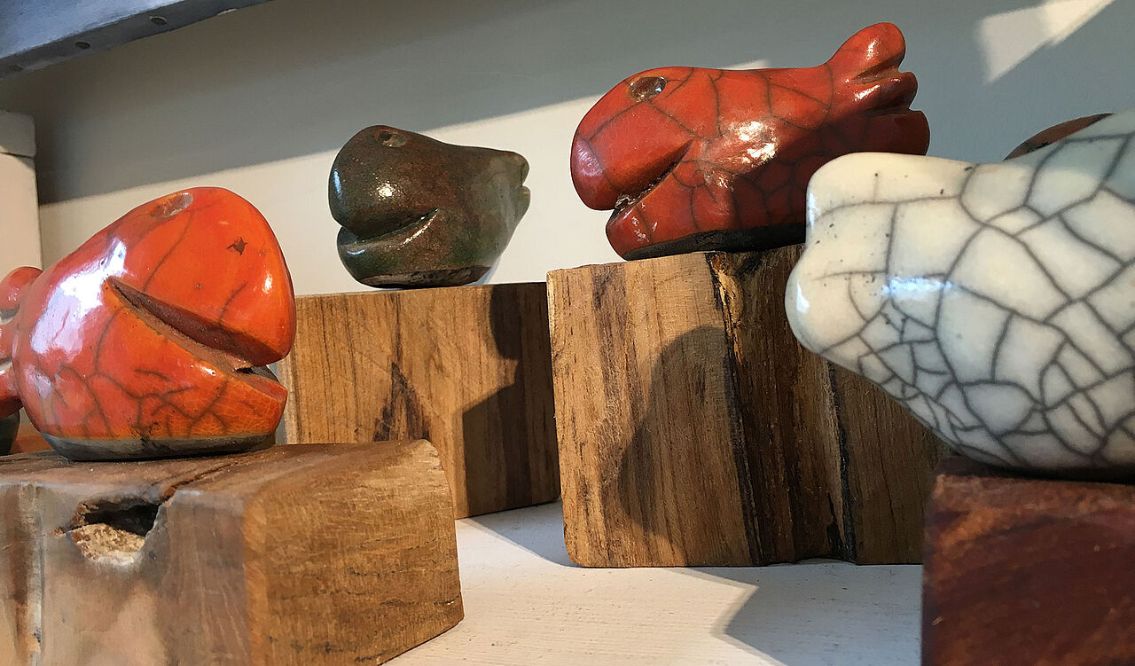 Kunstgalerie - Fische auf Holz